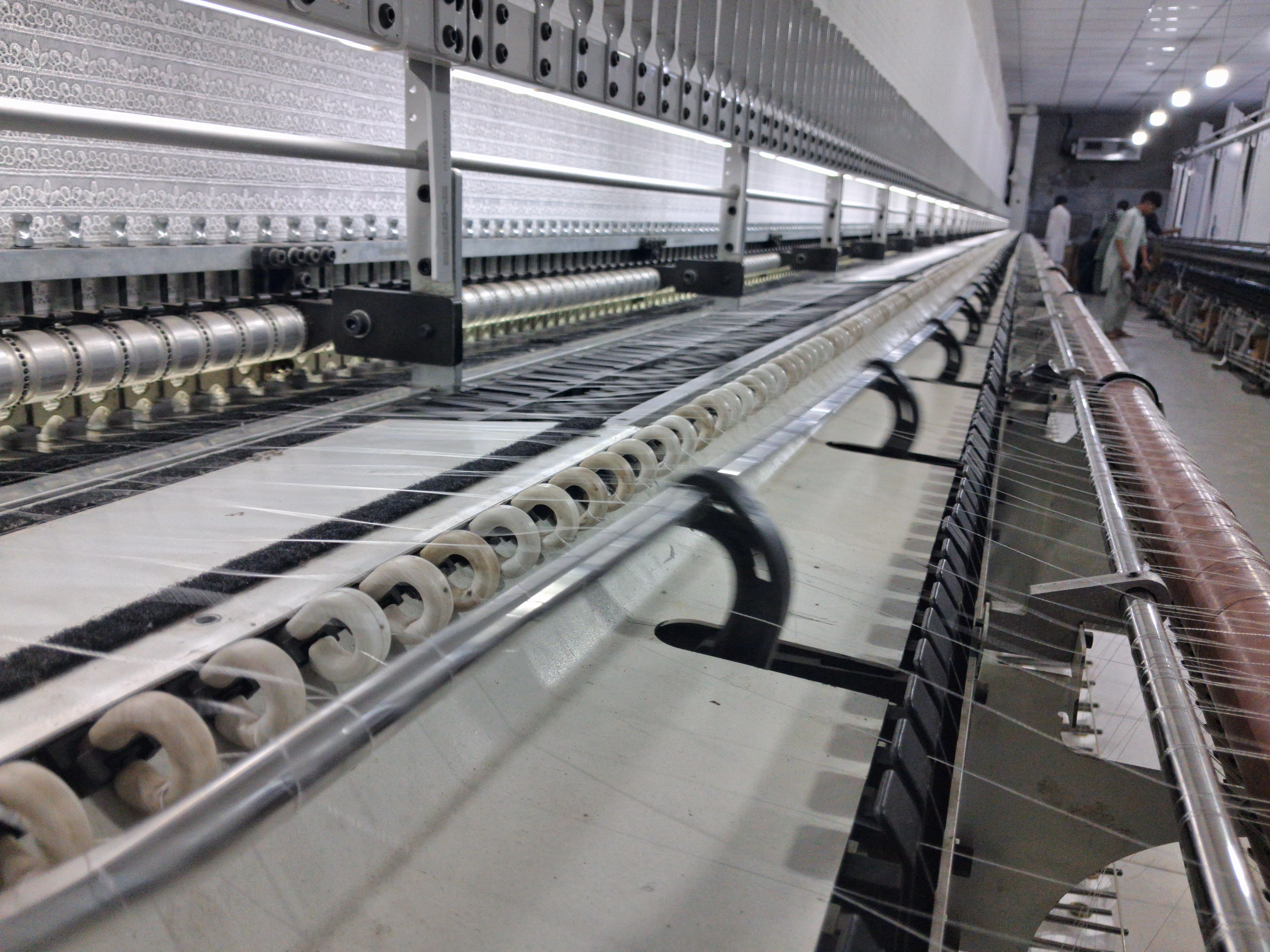 Lässer Schiffli embroidery machines running at Tariq Naeem Embroidery factory